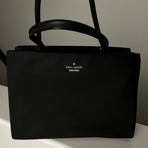 Kate Spade medium sized purse - black with gold details!